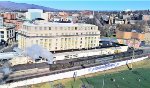 BLW 26 passing the former DL&W passenger station in Scranton, now a Radisson Hotel